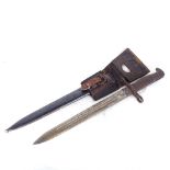 Antique bayonet stamped E366 with wooden handle, metal scabbard, length 43cm