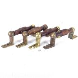 A set of 4 turned wood door handles with brass mounts, length 26cm