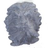 A cast-iron "Green Man" wall plaque, height 32cm