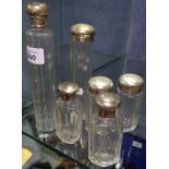 6 various silver-topped toilet bottles