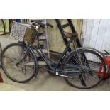 A Vintage butcher's/baker's bicycle with basket