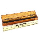 An all-brass spirit level in burr-walnut case, 50cm