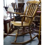 A good quality reproduction elm-seated Windsor rocking chair