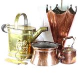 An umbrella style copper stick stand, a brass hot water can, folding rules etc