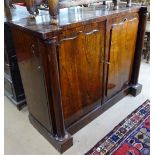 A Regency rosewood cabinet, with 2 shaped panelled doors, barrel turned pillisters, on shaped plinth