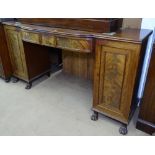 A Regency mahogany twin-pedestal sideboard of bow-front form, having a single frieze drawer, flanked