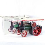 A boxed Mamod steam tractor