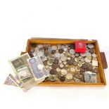 A tray of bank notes and coins