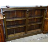 A double oak floor standing open bookcase, with adjustable shelves, W152cm, H113cm