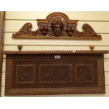 An ornately carved Anglo-Indian wall bracket, 72cm, and a carved oak lintel bracket