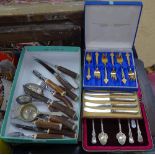 A cased set of 5 silver teaspoons with scrolled decoration, 2 cased sets of plated cutlery etc