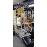 A painted wrought-iron garden arch bench, W101cm, H210cm