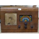 A walnut-cased valve radio, length 53cm