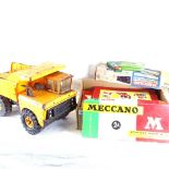 A Tonka Toy tipper truck, and a box of various Meccano