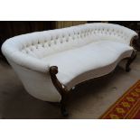 A Victorian walnut-framed bow-end parlour sofa, with buttoned upholstery, L198cm