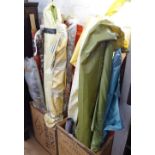 A large quantity of various rolls of material, including Colefax & Fowler, Textra etc
