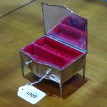 An Edward VII silver jewellery box in the form of a desk, lid monogrammed HSM and dated 1889-1914,