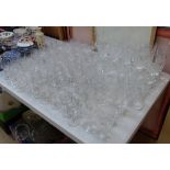 A large quantity of drinking glasses, including Champagne, tumblers and wine glasses