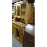 A Continental polished pine 2-section kitchen dresser, W130cm, H200cm