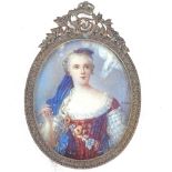 A signed hand painted oval miniature of a woman, in decorative gilt-metal frame, height 11cm