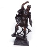 A patinated spelter figure of a knight with lion mask shield, height 50cm