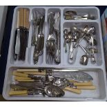 A tray of mixed Fiddle pattern and Old English pattern cutlery, various spoons and servers etc