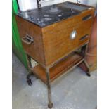 A Vintage teak-cased "The Genito-Urinary" machine, by MFG & Company Ltd London, W59cm