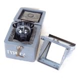 A military type E2A cased gimballed compass
