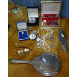 A silver-backed dressing table brush, Goldsmith & Silversmiths presentation pocket watch dated 1962,
