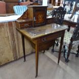 A Victorian rosewood lady's writing desk, with raised fitted cupboard and drawer back, single frieze