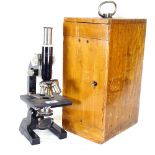 Vintage student's microscope with accessories and carrying case