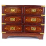 A hardwood table-top cabinet of 6 drawers with inset brass handles, height 32.5cm