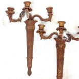 A pair of patinated cast-iron 3-branch wall lights with lustre drops, height 42cm