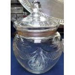 An Edwardian cut-glass biscuit barrel with silver rim