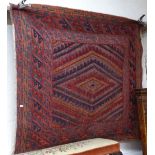 A red ground Gazak rug, 126cm x 127cm
