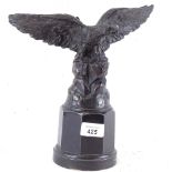 A spelter figure of an eagle on plinth, height 26.5cm