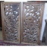 A pair floral carved hardwood panels, 75cm x 35cm