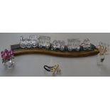 Boxed Swarovski locomotive, carriages and wagons, and Swarovski miniature camera, and vases of