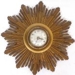 A Vintage starburst wall clock, 34cm