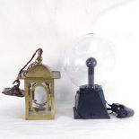 A Static Electricity globe lamp, height 29cm, and a brass lantern