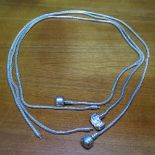 3 modern silver necklaces