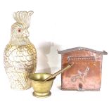 Bronze pestle and mortar, copper letter box, and a parrot ice bucket, 41cm