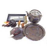 A box of Oriental items, including a Chinese tea kettle, hardstone miniature animals etc