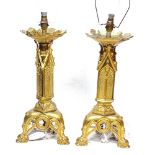 A pair of Continental gilt-brass candlesticks converted to table lamps, height to top of fitting