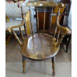 A Victorian Windsor stick-back kitchen chair, on turned legs