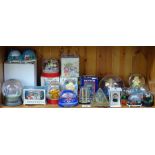 A collections of snow globes