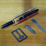 A Parker 61 fountain pen, a Parker Duo-fold pen and pencil, and a silver money clip, and 2