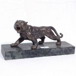 Antique patinated spelter tiger, length 25cm, on separate plinth