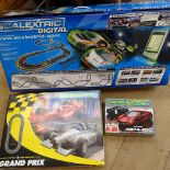 Boxed Scalextric Digital, with 2 Porsche, 2 Audis, and 2 Lamborghinis, and 2 other boxed