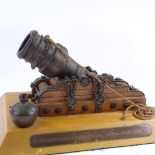 A bronze and stained wood model of a French mortar cannon, base length 34cm